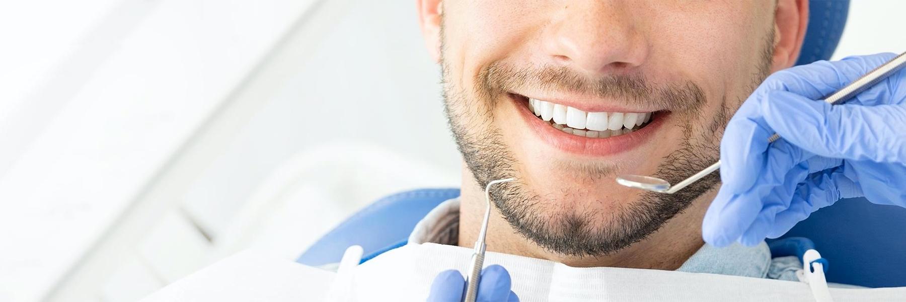 Close up of patient during dental crown procedure in Norfolk MA