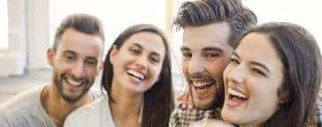 Group of people smiling together, norfolk ma